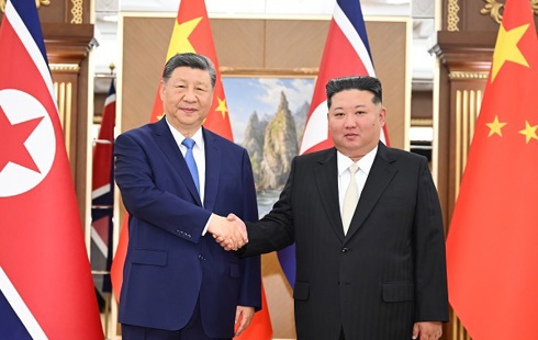 习近平同金正恩举行会谈