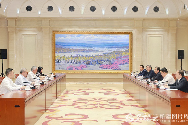 陈小江会见马来西亚—中国商务理事会主席卢成全