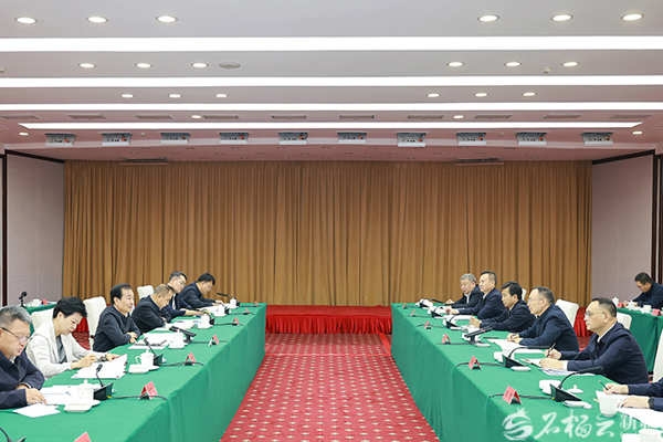 陈小江艾尔肯·吐尼亚孜会见中国融通集团董事长李文清